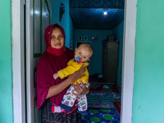 On 30 November 2021, UNICEF staff meet with beneficiaries during a visit to review progress of a cross-sectoral UNICEF programme aimed at reducing malnutrition in Sabang, Aceh Province, Indonesia.