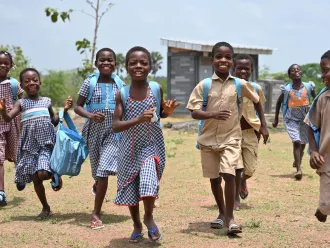 Children at the playground of their school made out of recycled plastic bricks, in Sakassou, in the center of Côte d’Ivoire.
