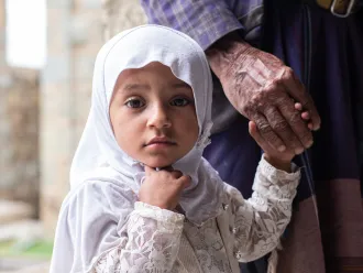 Somaya, 2 years old, is one of the children who came with her father, Walid Mohammed Ahmed Hassan, to get medical attention from the mobile clinic in Mazhar District, Raymah Governorate.
