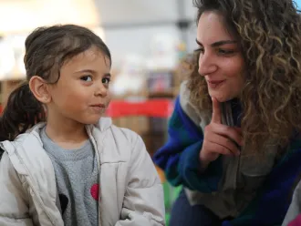 Little Elanur joins a psycho-social support activity at UNICEF supported CFS in Kahramanmaraş, Türkiye.