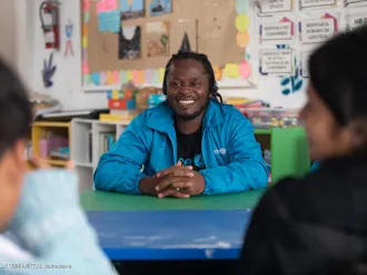 UNICEF Goodwill Ambassador Ishmael Beah at a shelter for unaccompanied adolescents who have fled their homes due to fears for their safety.
