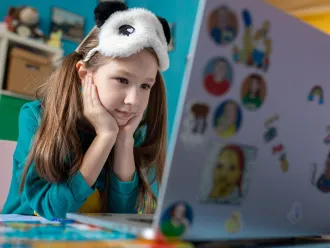 On 15 April 2020 in Kyiv, Ukraine, Zlata, 7, works on schoolwork from home, with all schools in the country closed as part of measures to combat the spread of COVID-19. 