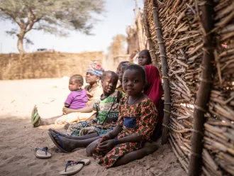 Children sitting on the ground