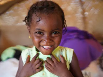 Chimaou, 3, a migrant child at the Seno site for migrants in quarantine due to COVID-19 in Niamey, Niger. 