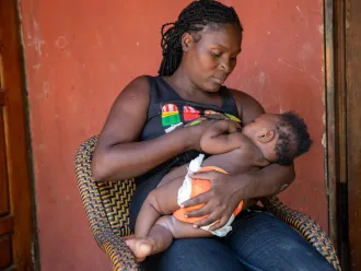 30-year-old Josena Alditor breastfeeds her 7-month baby boy Marc Carlo in Cap Haitien, Haiti.