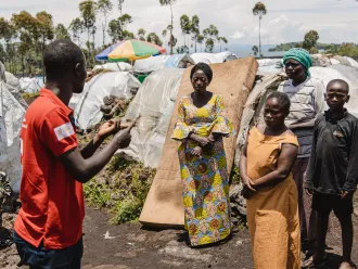 Bazapa Bageta is a first-aid volunteer with the Red Cross, a UNICEF partner organization in Bulengo, North Kivu province, DR Congo. He raises awareness among displaced people to combat cholera and water-borne diseases.
