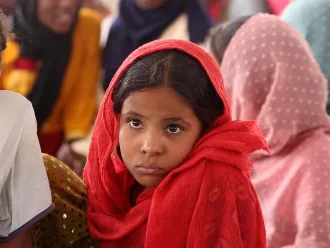 A portrait of a young girl at a Child Friendly Space (CFS) supported by UNICEF in Atbara, Sudan.