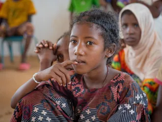 A displaced girl takes part in remedial classes to prepare for the return to school in the BAWA displaced person site