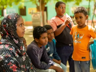 11-year-old Amna with her peers at the UNICEF supported Alshargia safe learning space or Makanna in Kassala state, Sudan.