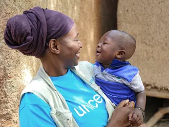 Woman holding a child