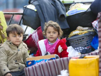 Children among the newly arrived families at a reception centre in Ar-Raqqa city, Syria, on 4 December 2024, who fled the escalating violence in Aleppo