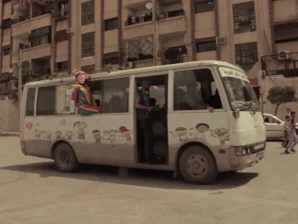 The Corona Van as it drives through the streets in Al Tal.