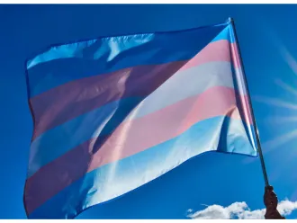 A Carrier of the Torch of Hope and Pride