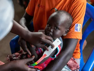  South Sudan. Woman and child at a nutrition site
