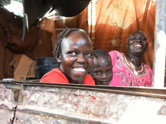 Khamisa smiles with her two youngest children